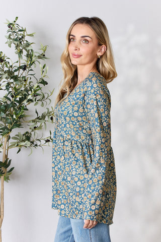 Shop Heimish Full Size Floral Half Button Long Sleeve Blouse - High-Quality U.S. Made Women’s Fashion with Free & Fast Shipping