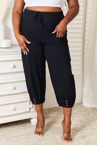 Shop Black Decorative Button Cropped Pants - High-Quality U.S. Made Women’s Fashion with Free & Fast Shipping