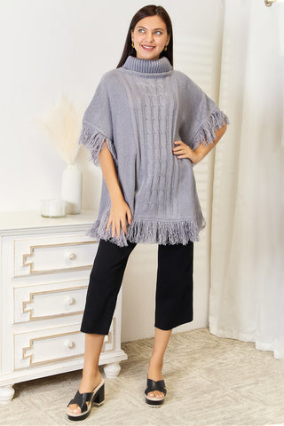 Shop Justin Taylor Turtle Neck Fringe Poncho - High-Quality U.S. Made Women’s Fashion with Free & Fast Shipping