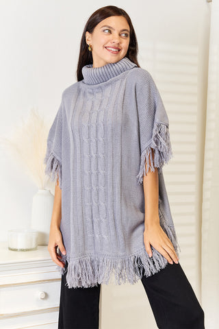 Shop Justin Taylor Turtle Neck Fringe Poncho - High-Quality U.S. Made Women’s Fashion with Free & Fast Shipping