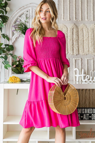 Shop Fuchsia Reborn J Smocked Ruffle Hem Dress - High-Quality U.S. Made Women’s Fashion with Free & Fast Shipping