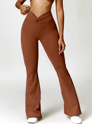 Shop Twisted High Waist Bootcut Active Pants with Pockets - High-Quality U.S. Made Women’s Fashion with Free & Fast Shipping