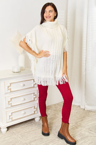 Shop Justin Taylor Turtle Neck Fringe Poncho - High-Quality U.S. Made Women’s Fashion with Free & Fast Shipping