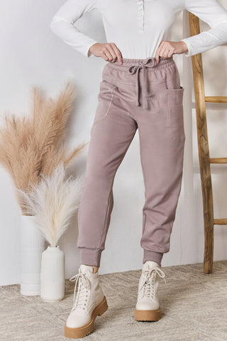 Shop Rosy Brown RISEN Drawstring Pocketed Joggers - High-Quality U.S. Made Women’s Fashion with Free & Fast Shipping