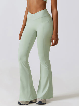 Shop Light Green Flare Leg Active Pants with Pockets - High-Quality U.S. Made Women’s Fashion with Free & Fast Shipping