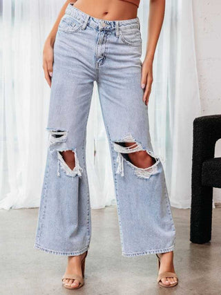 Shop Light Distressed Wide Leg Jeans with Pockets - High-Quality U.S. Made Women’s Fashion with Free & Fast Shipping