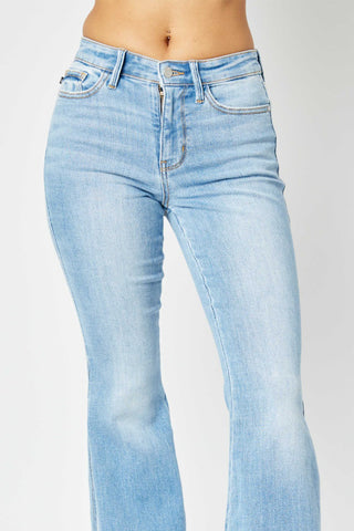 Shop Judy Blue Full Size Mid Rise Raw Hem Slit Flare Jeans - High-Quality U.S. Made Women’s Fashion with Free & Fast Shipping