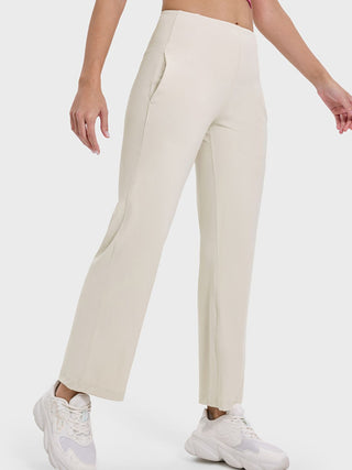 Shop Beige Pocketed High Waist Active Pants - High-Quality U.S. Made Women’s Fashion with Free & Fast Shipping