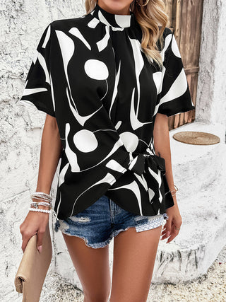 Shop Tied Printed Mock Neck Half Sleeve Blouse Now On Klozey Store - Trendy U.S. Premium Women Apparel & Accessories And Be Up-To-Fashion!